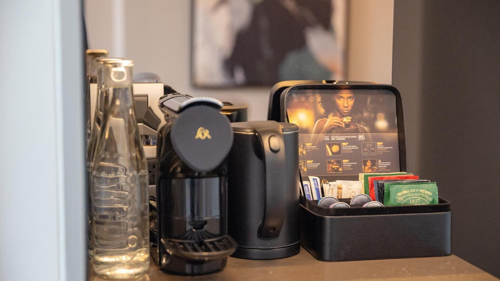 Chatrium Grand בנגקוק מראה חיצוני תמונה A Nespresso coffee machine